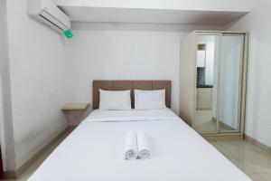 Modern Look and Comfortable Studio Barsa City Apartment By Travelio