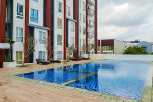Modern Look and Comfortable Studio Barsa City Apartment By Travelio
