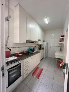Apartamento Pé na Areia Guarujá Pitangueiras