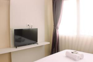Cozy and Comfort Living 1BR at Oasis Cikarang Apartment By Travelio