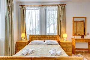 Alpine Haven 2-Bedroom Escape, Pamporovo by Flat Mаnager