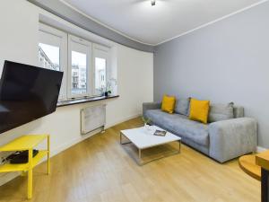 Modern and Comfortable Studios with Smart TVs near PGE by Noclegi Renters