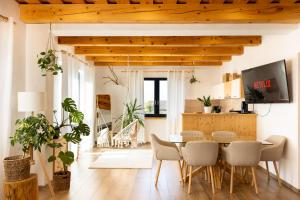 Slow Mountain Family Base - Spacious 2BR Apartment, 2 Bath, Sleeps 8 with Mountain View and Backyard in Liptov