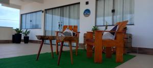 Charmosa acomodação com vista para o mar