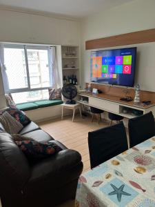 Apto Pitangueiras Pé na Areia e Vista do Mar