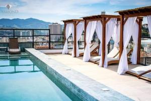 Confortável e lindo Flat c ar e piscina no centro - Ubytování bez kategorie ve městě São Lourenço