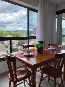 Confortável e lindo Flat c ar e piscina no centro