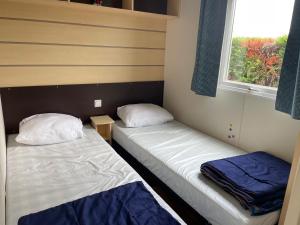 Maisons de vacances Mobile home - 3 bedrooms - Cc718 Les Charmettes 4 stars : photos des chambres