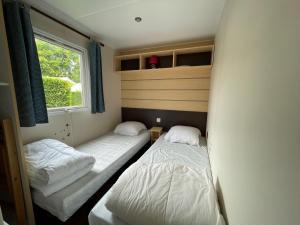 Maisons de vacances Mobile home - 3 bedrooms - Cc718 Les Charmettes 4 stars : photos des chambres