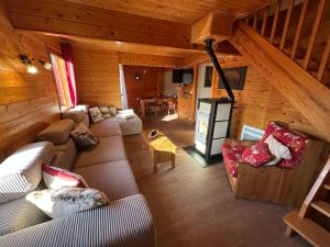 Maisons de vacances Le chalet des Broches - jacuzzi : photos des chambres
