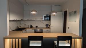 Spacious room in modern central apartment