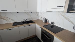 Spacious room in modern central apartment