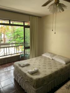 Suite Bueno econômica com Ar split Tv a acabo Wi-fi fibra local otimo e rico em comércio