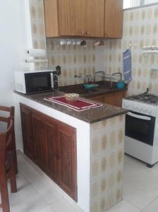 Apartamento pé na areia
