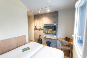 Hotels Hotel Ibis Budget Rennes Cesson : photos des chambres
