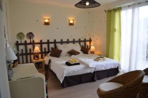 B&B / Chambres d'hotes Couette Et Cafe Creme : photos des chambres