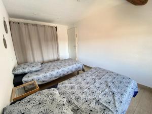 Appartements Saint Michel, T3 centre de Gigean : photos des chambres