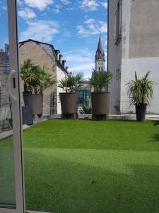 Appartements Grand T4 Terrasse proche sanctuaire : photos des chambres