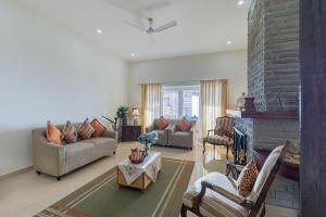 ELIVAAS 3BHK Plus Attic Cliffside Villa with Scenic Views