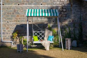 ELIVAAS 3BHK Plus Attic Cliffside Villa with Scenic Views