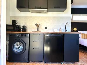 Appartements Studio Preto - Confort moderne - Terrasse - Parking gratuit - Non fumeur : photos des chambres
