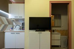 Appartements Logements A 2 PETITS PAS : photos des chambres
