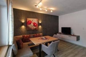 Two-Bedroom Apartment with Balcony room in Haus Enzian