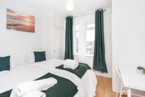 Cozy Cottage 2 Bedroom Apartment with free Parking