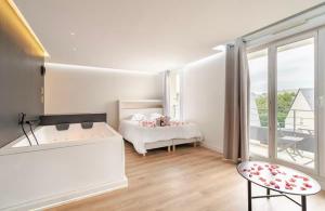 Appartements LOVE ROOM SAUNA,JACCUZZI Netflix Tours : photos des chambres