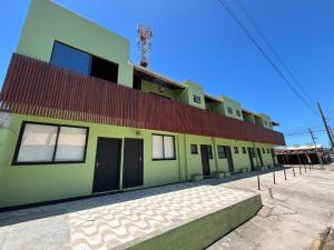 Brisa Ferrugem apenas uma quadra da Praia da Ferrugem e Bar do Zado