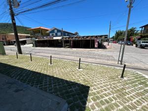 Brisa Ferrugem apenas uma quadra da Praia da Ferrugem e Bar do Zado