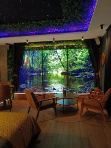 B&B / Chambres d'hotes Multiverse Suite immersive : photos des chambres