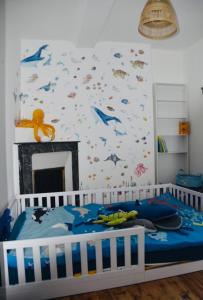 Maisons de vacances SWORD BEACH - Maison de ville en bord de mer a 50m des plages : photos des chambres