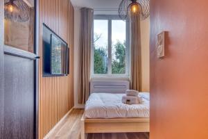 Appartements L-Oasis - Bel appart climatise quartier point du jour Lyon 5 : photos des chambres