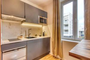 Appartements L-Oasis - Bel appart climatise quartier point du jour Lyon 5 : photos des chambres