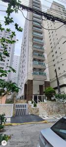 Apartamento confortável perto da praia das Pitangueiras duas vagas de garagem