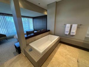 Ocean View Premium Room incl garage and access to the garden and pool of Loloho Lodge