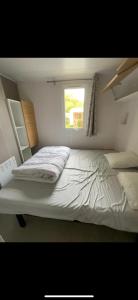 Villages vacances Location mobile-home confort face au lac : photos des chambres
