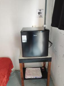 Suite com estacionamento privativo próximo a praia