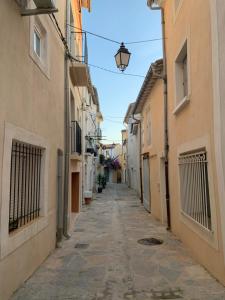 Maisons de vacances Quiet street in old Meze - terrace, 250m to beach : photos des chambres
