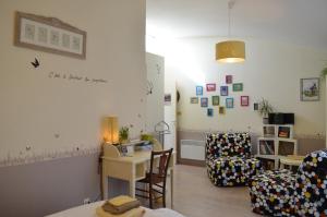 B&B / Chambres d'hotes Couette Et Cafe Creme : photos des chambres