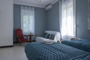 Sejours chez l'habitant La Villa Plaisance - maison et Chambres d hotes a proximite de Chateaneuf-du-Pape : photos des chambres
