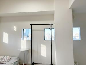 Shinjuku Kabuki Youth Hostel#New Sunshine Room#50 second walk from Higashi Shinjuku subway#Automatic locking door at entrance#新宿1