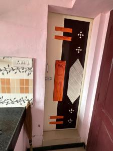 PM COTTAGE-2nd FLOOR-NON AC ROOM WITH GREEN NATURAL VENTILATION ONLY FOR PILGRIMS ,FAMILY OR BACHLOR