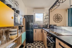 Appartements Magnifique Appart 10min de Disney : photos des chambres
