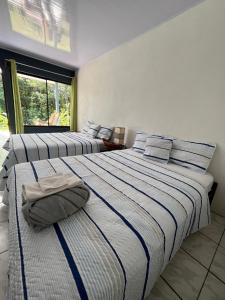 Villa Granja Agua Azul-wi-fi-AC-6 Personas-parqueo