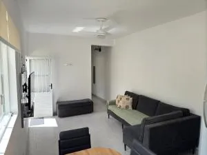 Casa nova térrea familiar com ar condicionado e estacionamento em Cananeia - Cajati