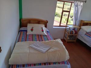 kaypi rosas wasi Amantani