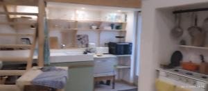 Appartements Maison de plain pied 2 pieces tout equipe sur jardin arbore : photos des chambres