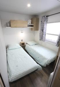 Campings Charme, Confort & Espace, 3 ch, 40 m2, super equipe : photos des chambres